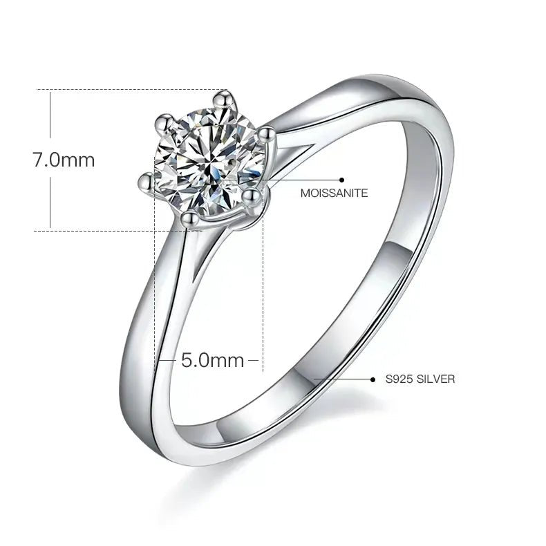 The Solmara 0.5CT round-cut Moissanite ring in polished S925 silver 💍✨. Perfect for engagement or wedding, offering amazing value!
