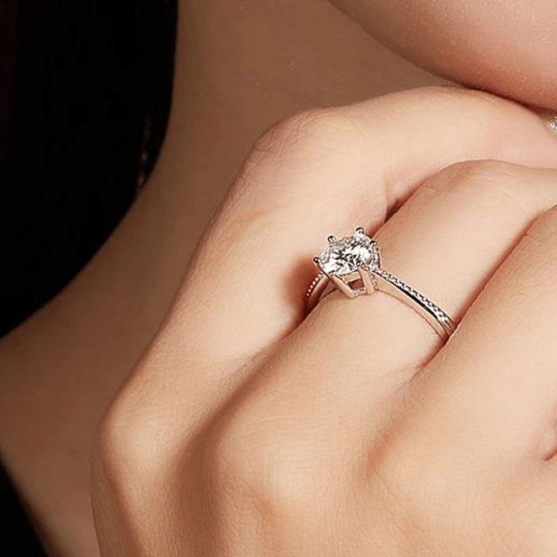 Close-up of The Solvienne Moissanite Solitaire Ring 🥰✨, showcasing its round-cut brilliance and elegant band design.