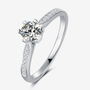 Elegant Moissanite ring with 0.5CT center stone and pavé-set side stones, a perfect engagement or wedding choice! 💍✨