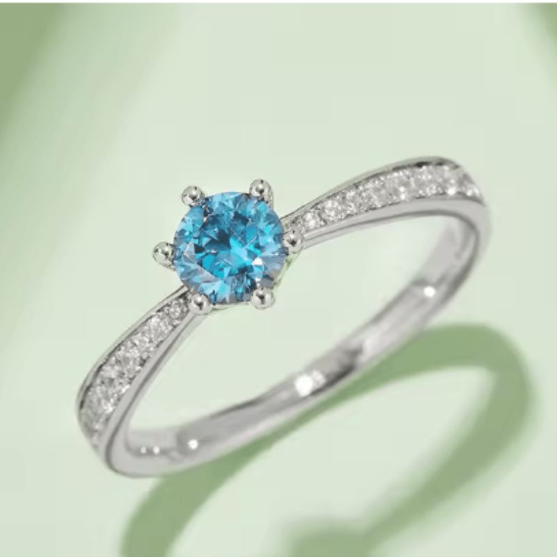 Stunning blue gemstone ring in 14K white gold, perfect for engagement or wedding. 💍✨ Amazing value and elegance!