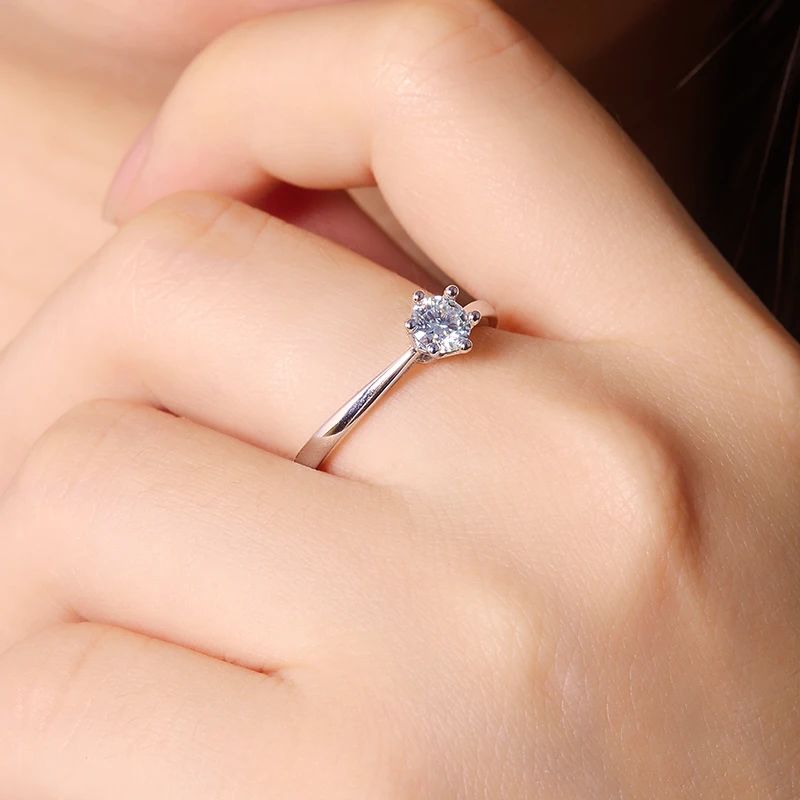 Moissanite solitaire ring on hand, showcasing brilliance and elegance 💍✨ Perfect for engagement or wedding celebrations!