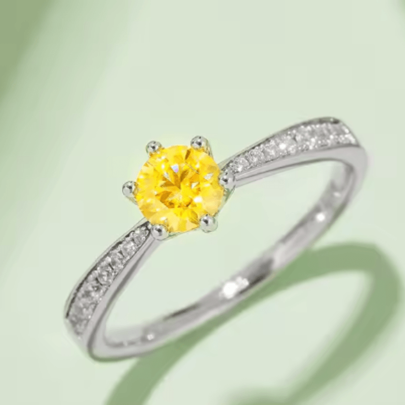 Stunning yellow gemstone engagement ring with diamonds on a sleek band. Perfect for weddings and amazing value! 💍✨
