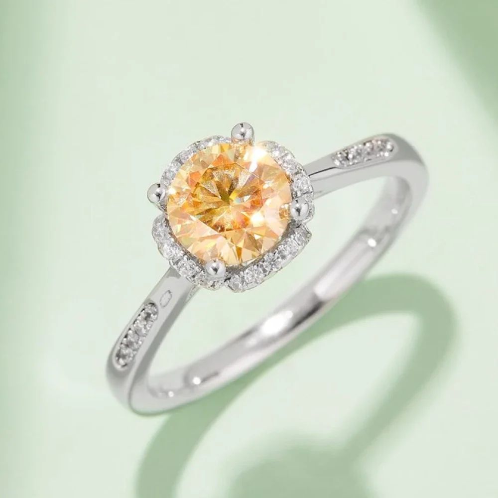 Stunning Moissanite engagement ring with a round center stone and sparkling halo 💍✨ Amazing value for weddings!
