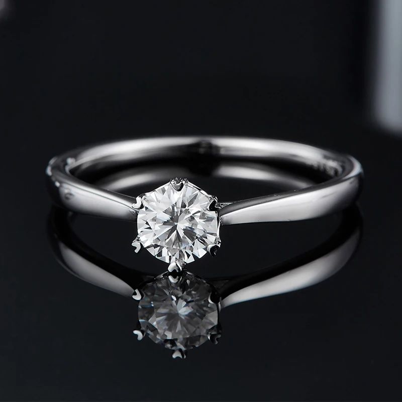 Stunning 0.5CT round-cut Moissanite ring in 925 sterling silver, perfect for engagement or wedding. 💍✨ #AmazingValue #Moissanite