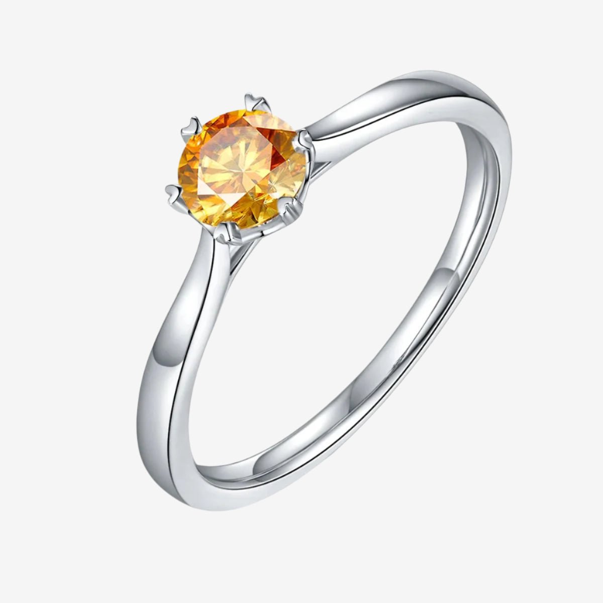 Stunning round-cut Moissanite ring with a vibrant yellow stone in a sleek silver band. Perfect for engagement or wedding! 💍✨