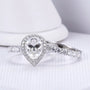 Stunning pear-cut moissanite halo ring 3CT, perfect for engagement or wedding. 💍✨ Unmatched sparkle and amazing value!