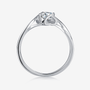 Side view of The Zorielle 0.5CT Moissanite Ring 💍, featuring a stunning round-cut gem in a bypass tension setting. Amazing value!