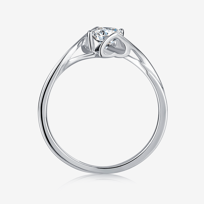 Side view of The Zorielle 0.5CT Moissanite Ring 💍, featuring a stunning round-cut gem in a bypass tension setting. Amazing value!